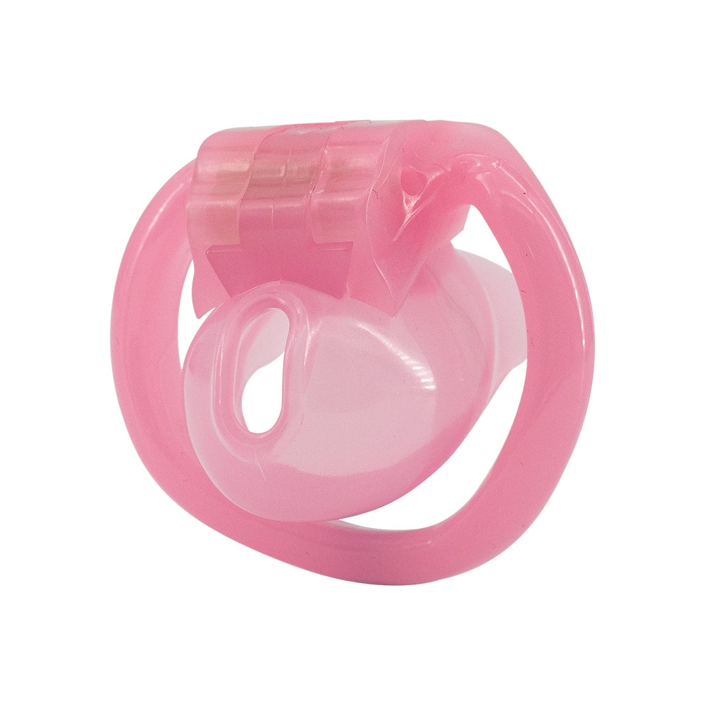 Unlock new experiences with the lockable Pink Holy Trainer V3 small. This mini features a harness design studded with gold and diamonds. Made from hypoallergenic resin to avoid metal allergies, it's comfortable, secure, and perfect for spicing up your intimacy.