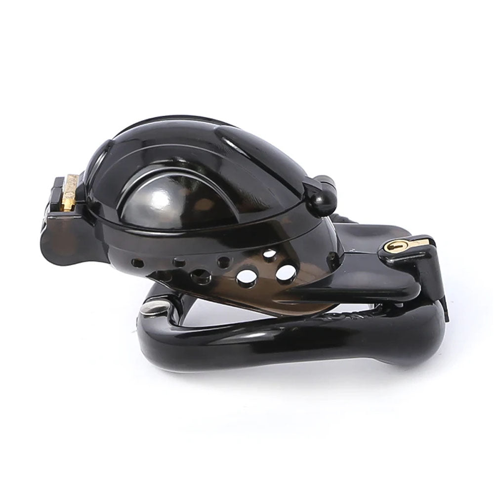 Tired of negative experiences with ill-fitting devices? The Lock, Stock, And cage is a ball-trap device that securely traps without the need for piercing. Its adjustable rings prevent testical slippage, ensuring your Sub stays locked and comfy!