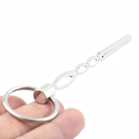 Experience ultimate control with our stainless steel chastity cage, perfect for sounding cock enthusiasts. Included are a sleek rod, a line of sizes for a perfect fit, and a stocking sock for easy, comfortable application.