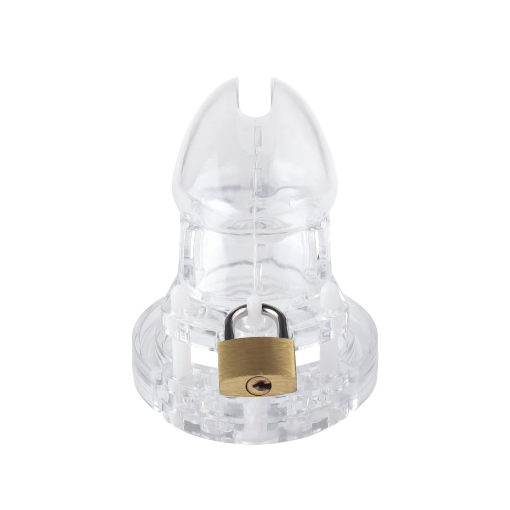 Max's mistress takes control to another level with this transparent plastic cage, a non-metal solution for their dynamic. With five rings, it's a perfect fit, even when in public. Laughs and devotion ensured.