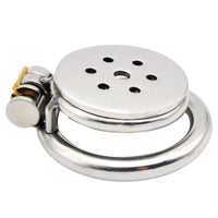 Inverted chastity device crafted from steel enhances control by incorporating anal stimulation via plug. Perfect for ruin scenarios, combining electrosex with a sleek, flat, discreet style.