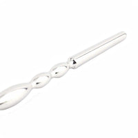 Experience unprecedented urethral pleasure with our wide, smooth, insertable rod. This chastity device penis plug enhances your sounding cock adventures, featuring a loop handle like a string for safe and easy control. Perfect for both beginners and enthusiasts.