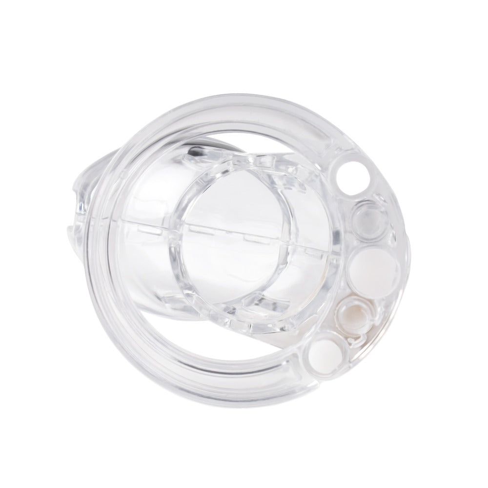 Experience the progression of your own feminization journey with the Plight In Plain Sight chastity kit. Designed for femdom enthusiasts, this clear plastic cage offers adjustable sizing to ensure complete control and perfect punishment. Embrace your desires and take ownership of your submission with this essential tool.
