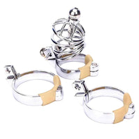 Embrace the brutal force of submission with this stainless steel penis plug cage, offering extremely prolonged control. Lose yourself in the intense pleasure of denied arousal.