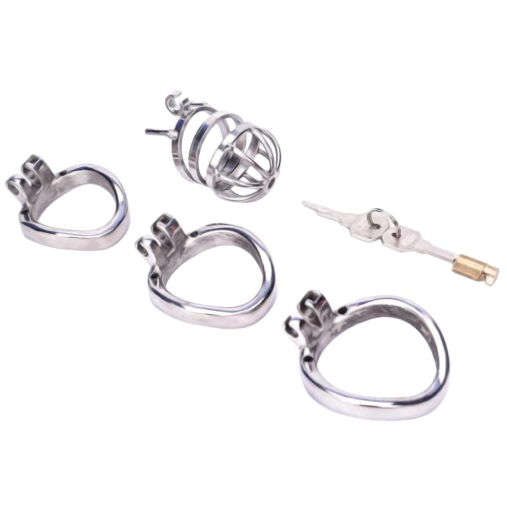 Merciless Chastity Enforcer: a metal cock cage for the daring sounding male. On your knees, shaved and brushed clean, your control is stripped away. Don't let desires rot; embrace merciless chastity.