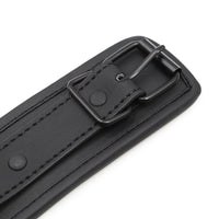 Embrace control with our Black BDSM Chastity Training Collar. Crafted from vegan leather for comfort, it offers secure enclosure and full coverage, challenging even a modern Houdini. Includes leash for added dominance.