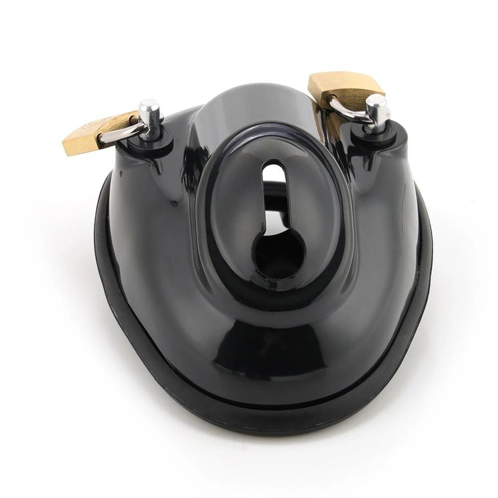 The Solitary Confinement metal cock cage embodies outward submission and inward focus, with nubs enhancing sensory expansion. Its robust design limits any expansion, reinforcing control and intimacy.
